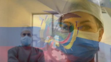 Ameliyathanede cerrahların üzerinde sallanan ekvator bayrağının animasyonu. küresel tıp, covid 19 pandemik konsept sırasında sağlık hizmetleri dijital olarak üretilen video.