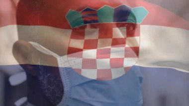 Covid 19 salgını sırasında yüzü maskeli bir adamın üzerinde sallanan Hırvat bayrağının canlandırılması. küresel covid 19 salgın konsepti dijital olarak oluşturulmuş video.
