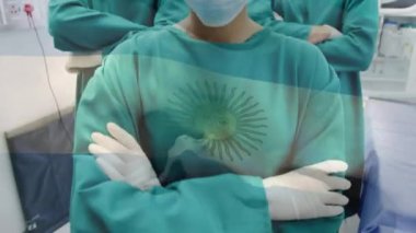 Ameliyathanede cerrahların üzerinde sallanan Arjantin bayrağının animasyonu. küresel tıp, covid 19 pandemik konsept sırasında sağlık hizmetleri dijital olarak üretilen video.