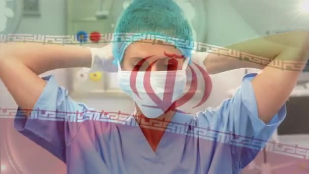 Animacja Flagi Irańczyka Machającego Nad Chirurgami Sali Operacyjnej Globalna Medycyna — Wideo stockowe