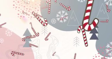 Gri arka planda soyut şekillere çarpan çoklu şeker kamışı ikonları ve kar taneleri. Noel şenliği ve kutlama konsepti