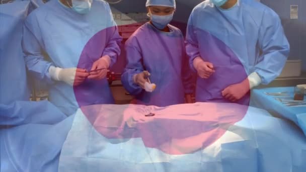 Animazione Bandiera Del Giappone Sventola Sui Chirurghi Sala Operatoria Medicina — Video Stock