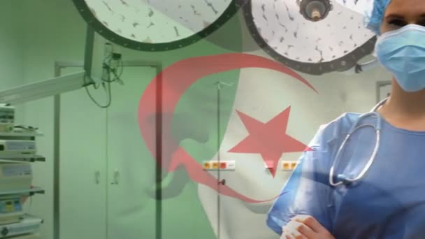 Animation Drapeau Algérie Agitant Sur Les Chirurgiens Dans Bloc Opératoire — Video