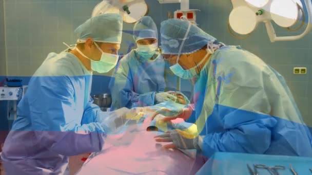 在手术室里 在外科医生面前挥动旗子的动画 全球医学 围产期保健服务 数码制作的19种流行病概念视频 — 图库视频影像