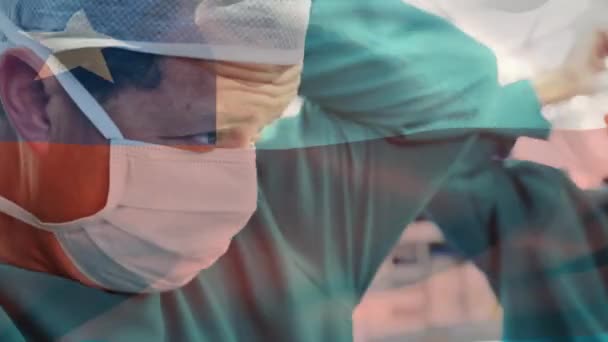 Animação Bandeira Chile Acenando Sobre Cirurgiões Sala Operações Medicina Global — Vídeo de Stock
