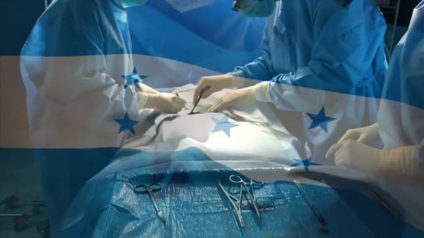 Animacja Flagi Hondurasów Machających Nad Chirurgami Sali Operacyjnej Globalna Medycyna — Wideo stockowe