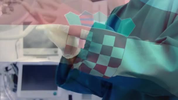 Animación Bandera Croacia Ondeando Sobre Cirujanos Quirófano Medicina Global Servicios — Vídeo de stock
