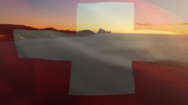 Denizdeki dalgaların havadan görüntüsüne karşı dalgalanan İsviçre bayrağının dijital bileşimi. Ulusal seyahat ve turizm kavramı