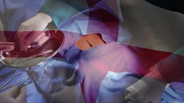 Ameliyathanede cerrahlar yerine İngiltere bayrağının canlandırılması. küresel tıp, covid 19 pandemik konsept sırasında sağlık hizmetleri dijital olarak üretilen video.