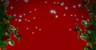 Noel çelengi süslemesi ve kırmızı zemine düşen çoklu yıldız simgeleri. Noel şenliği ve kutlama konsepti