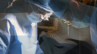 Ameliyathanede cerrahlar yerine Arjantin bayrağının canlandırılması. küresel tıp, covid 19 pandemik konsept sırasında sağlık hizmetleri dijital olarak üretilen video.