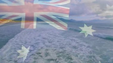 Avustralya bayrağının dijital bileşimi denizdeki dalgaların havadan görüntüsüne karşı. Ulusal seyahat ve turizm kavramı