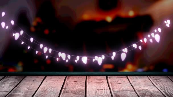 Brilhante Decoração Luz Fada Rosa Pendurada Sobre Prancha Madeira Texturizada — Vídeo de Stock
