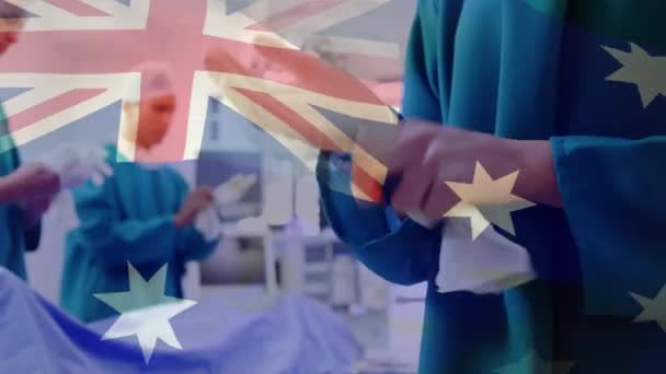Animación Bandera Australia Ondeando Sobre Cirujanos Quirófano Medicina Global Servicios — Vídeos de Stock