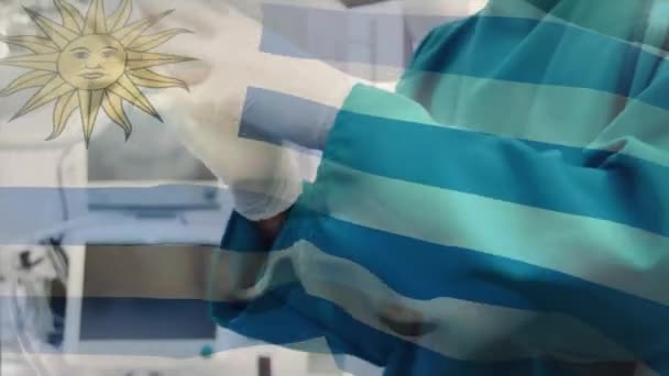 Κινούμενο Σχέδιο Της Σημαίας Του Ουρουγκούι Κυματίζει Πάνω Χειρουργό Στο — Αρχείο Βίντεο