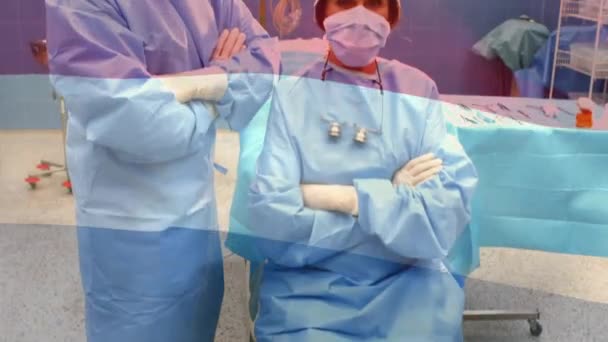 Κινούμενη Σημαία Των Κάτω Χωρών Κυματίζει Πάνω Χειρουργούς Στο Χειρουργείο — Αρχείο Βίντεο