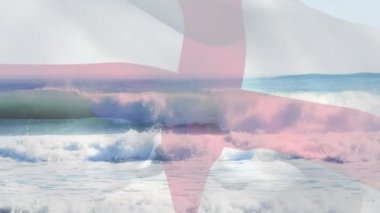 Denizde dalgalara karşı İngiltere bayrağı sallamanın dijital bileşimi. Ulusal turizm ve seyahat kavramı