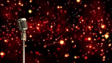 Parlayan ışık noktalarının üzerinde retro mikrofon animasyonu. Vintage noeller, müzik, gelenek ve dijital olarak üretilen kutlama konsepti.