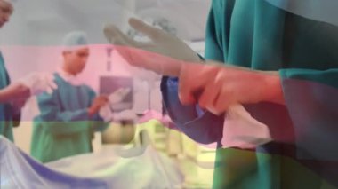 Cerrahların ameliyat odasında sallanan Alman bayrağının animasyonu. küresel tıp, covid 19 pandemik konsept sırasında sağlık hizmetleri dijital olarak üretilen video.