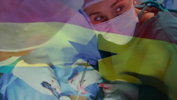 Animation Flag Ghana Waving Surgeons Operating Theatre Global Medicine Healthcare — Stock Video