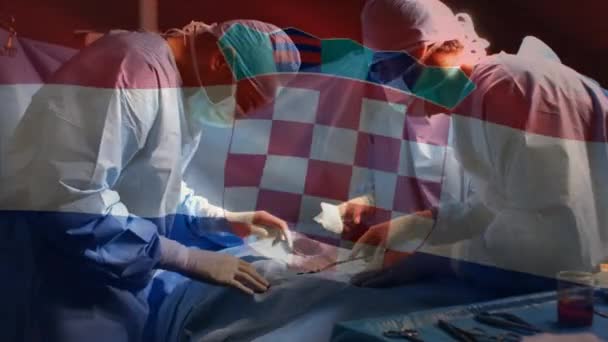 Animación Bandera Croacia Ondeando Sobre Cirujanos Quirófano Medicina Global Servicios — Vídeo de stock