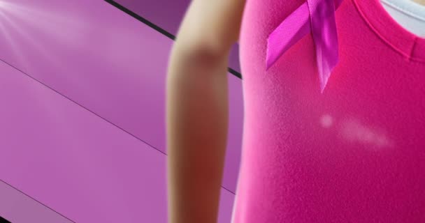 用粉红缎带和穿着粉红T恤的妇女创作乳腺癌宣传日文集 乳腺癌意识和女性健康概念数码视频 — 图库视频影像
