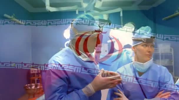 Animacja Flagi Irańczyka Machającego Nad Chirurgami Sali Operacyjnej Globalna Medycyna — Wideo stockowe