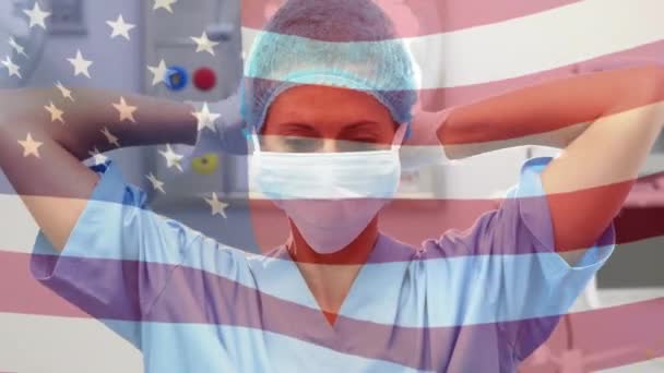 Animación Bandera Ondeando Sobre Cirujanos Quirófano Medicina Global Servicios Salud — Vídeo de stock