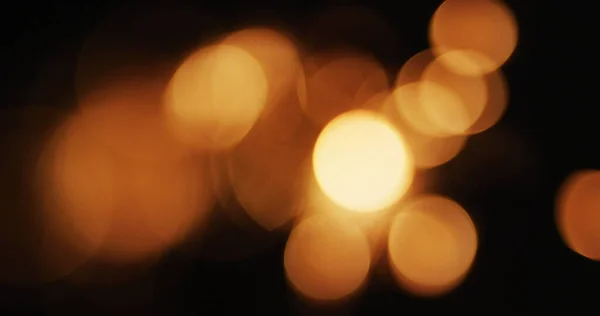 Meerdere Warme Oranje Lichten Flikkeren Zwarte Achtergrond Kerstmis Oudejaarsavond Feest — Stockfoto