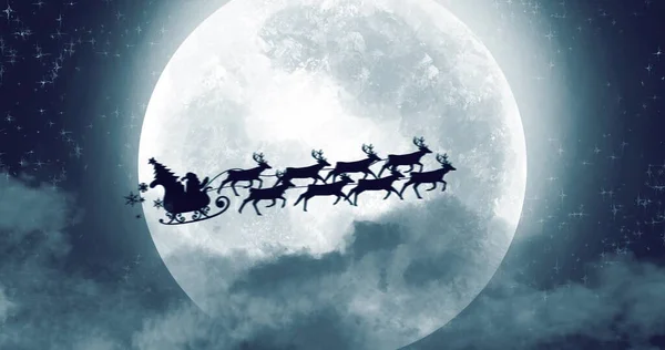 Силуэт Санта Клауса Сани Олени Летят Над Луной Заднем Плане — стоковое фото