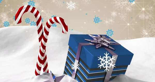 クリスマスプレゼントやお菓子の上に雪が降るイメージ クリスマス お祝いのコンセプトをデジタルで — ストック写真