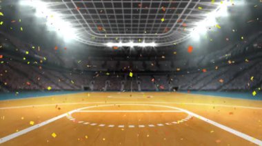 Basketbol sahasındaki stadyumun üzerine düşen konfeti animasyonu. spor, kutlama ve yarışma konsepti dijital olarak oluşturulmuş video.