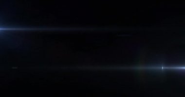 Siyah arkaplan üzerindeki ışık ve noktaların animasyonu. Noel, gelenek ve kutlama konsepti dijital olarak oluşturuldu.