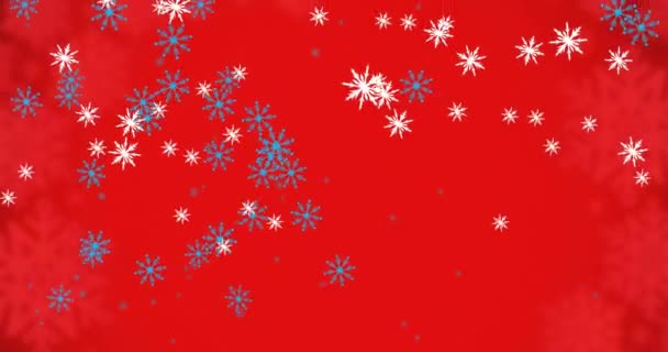 赤い背景に雪片の落下のアニメーション クリスマス お祝いのコンセプトをデジタルで — ストック動画
