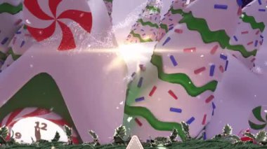 Mutlu noel mesajları ve kar gece gökyüzüne karşı kış manzarasında birçok evin üzerine yağıyor. Noel şenliği ve kutlama konsepti