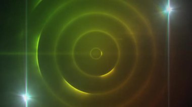 Parlayan dairelerin ve yeşil uzayda hareket eden ışığın animasyonu. renk, hareket ve dijital arayüz kavramı dijital olarak oluşturulmuş video.