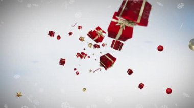 Birden fazla Noel konsepti simgeleri düşüyor ve kar taneleri gri arka planda yüzüyor. Noel şenliği ve kutlama konsepti