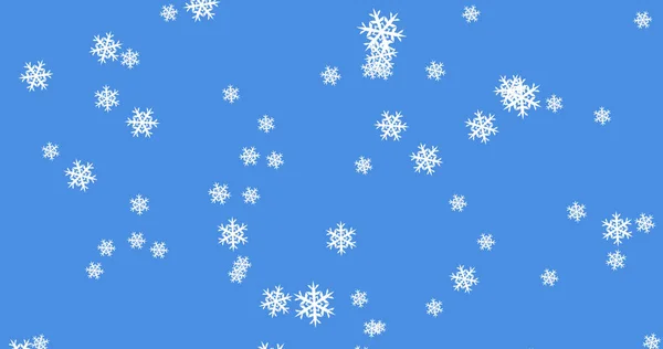 青い背景に落ちていく複数の輝く雪の結晶粒子のイメージ 冬のクリスマスシーズンのコンセプトデジタル生成画像 — ストック写真