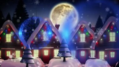 Mavi süslemeler sallanıyor ve kış manzarasında birçok evin üzerine kar taneleri düşüyor. Noel şenliği ve kutlama konsepti