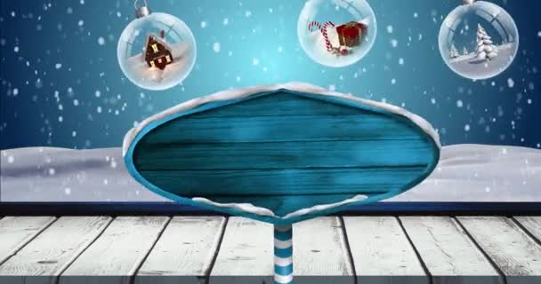 雪の上のコピースペースと青の背景に赤ちゃんと道路標識のアニメーション クリスマス お祝いのコンセプトをデジタルで — ストック動画