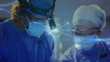 Ameliyathanedeki cerrahlar üzerinden bağlantı ağının animasyonu. Dijital olarak üretilen tıbbi ve sağlık teknolojisi kavramı.