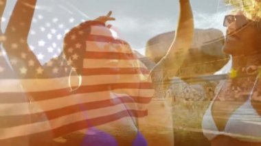 Sahilde ve stadyumda eğlenen bir grup arkadaşa bayrak sallama animasyonu. seyahat, tatiller, vatanseverlik ve dijital olarak üretilen video konsepti.