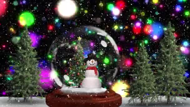 Красочные Голубые Светлые Пятна Снег Падает Снеговика Снежный Шар Против — стоковое видео