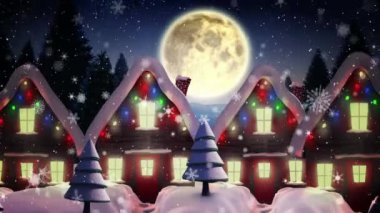 Kış mevsiminde gökyüzünde aya karşı birden fazla evin üzerine düşen kar taneleri. Noel şenliği ve kutlama konsepti