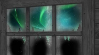 Aurora Borealis 'in animasyonu ve pencereden görülen Noel kış manzarası. Noel, gelenek ve kutlama konsepti dijital olarak oluşturuldu.