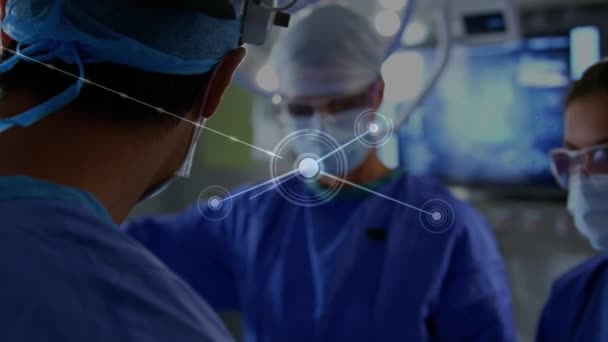 手術室で外科医とのつながりのアニメーション 医療技術の概念はデジタルで生成され — ストック動画