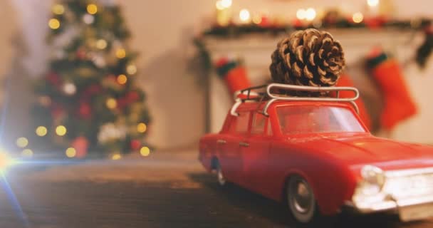 Composição Luz Sobre Decorações Natal Com Carro Pinho Cone Natal — Vídeo de Stock
