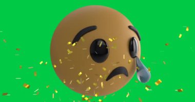 Yeşil ekran arka planında ağlayan emoji simgesi üzerine düşen konfeti animasyonu. Dijital ortamda oluşturulan sosyal medya, iletişim ve kutlama konsepti.
