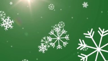 Yeşil arka plandaki ışık noktasına düşen kar tanelerinin dijital animasyonu. Noel şenliği ve kutlama konsepti
