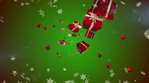 雪花飘落 圣诞糖果手杖 铝箔和礼物图标在绿色背景下飘扬 圣诞节的庆祝和庆祝概念 — 图库视频影像